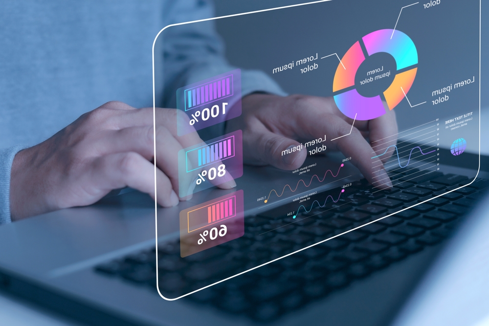 Businessman using computer and dashboard for data business analytics and data management system