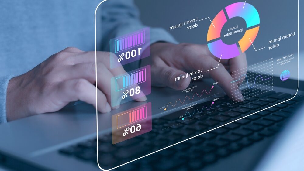 Businessman using computer and dashboard for data business analytics and data management system with virtual chart of finance